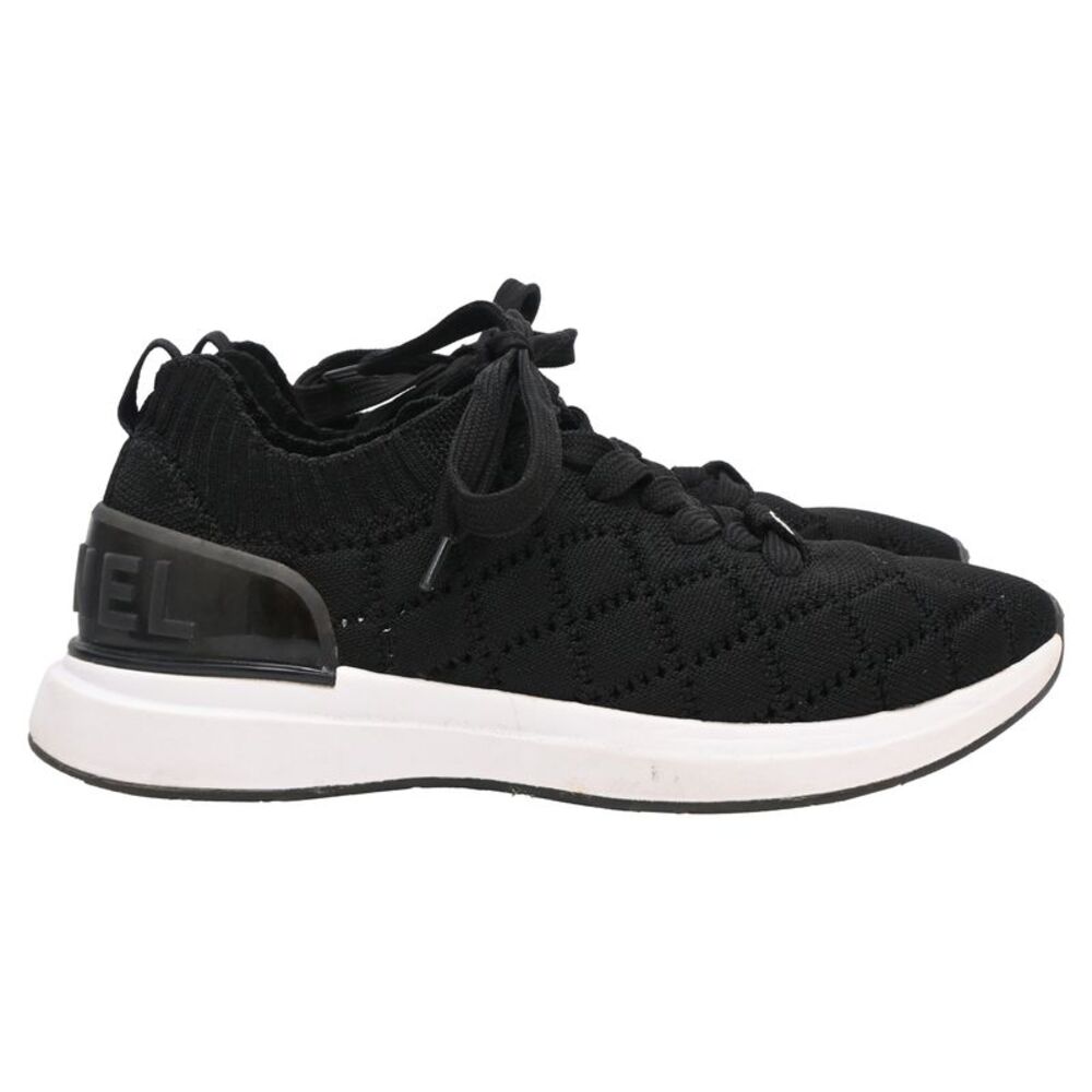 Chanel Quilted Knit Low-Top Sneakers in Black Polyester